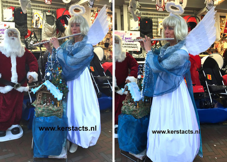 Witte Kerstengel = dwarsfluitiste, Verkleed als Witte Kerstengel weet de muzikante de juiste sfeer op uw kerstmarkt of winterbraderie te bewerkstelligen met haar gezellige kerstdeuntjes. 